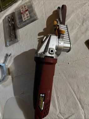Red Handheld Belt Sander by Chicago